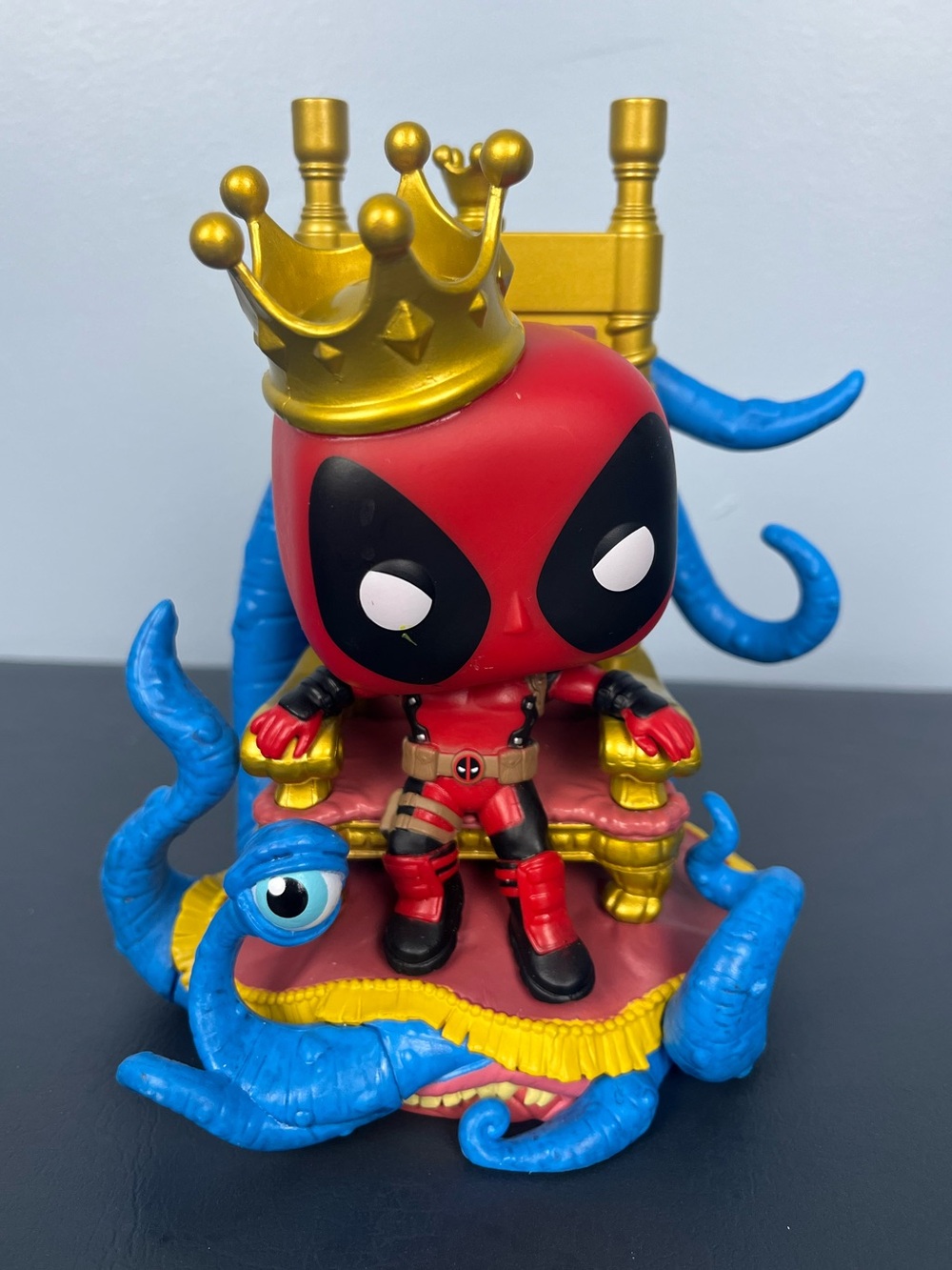 Funko pop Deadpool on throne vinyl figure